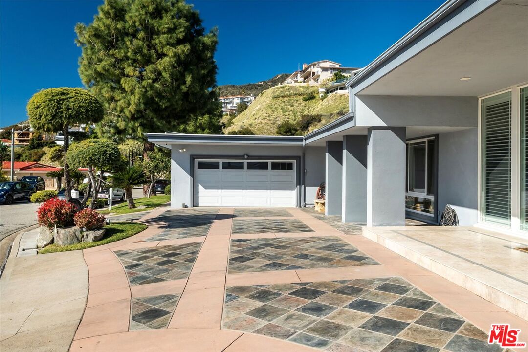 1975 Deermont Road Glendale, CA 91207 - Photo 32 of 42 a front view of a house with a porch