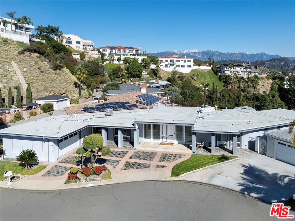 1975 Deermont Road Glendale, CA 91207 - Photo 35 of 42 an aerial view of a house with a garden and patio