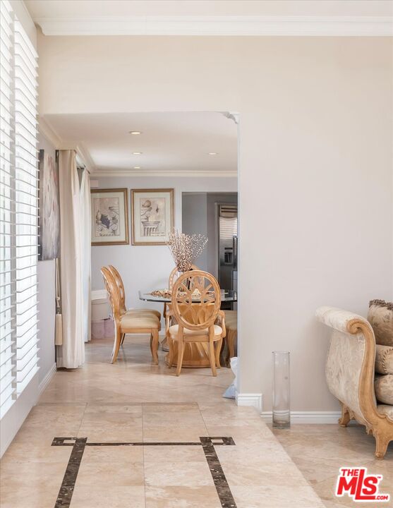 1975 Deermont Road Glendale, CA 91207 - Photo 7 of 42 a spacious bedroom with a bed and chair