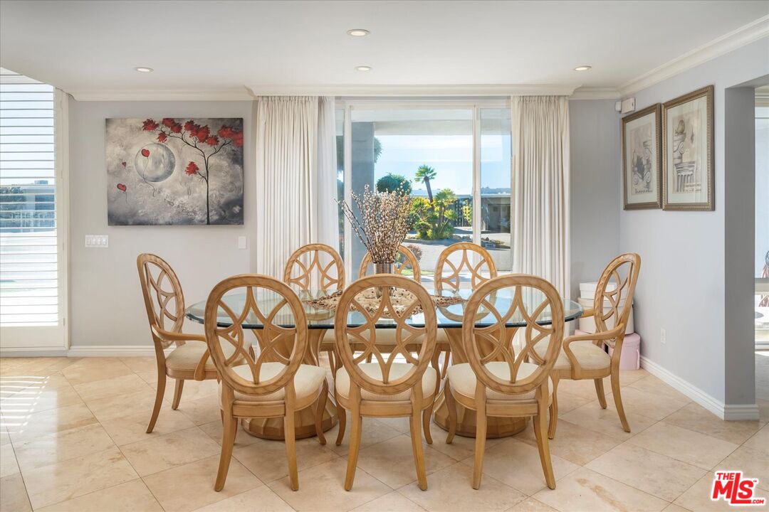 1975 Deermont Road Glendale, CA 91207 - Photo 8 of 42 a view of a dining room with furniture a painting and wooden floor