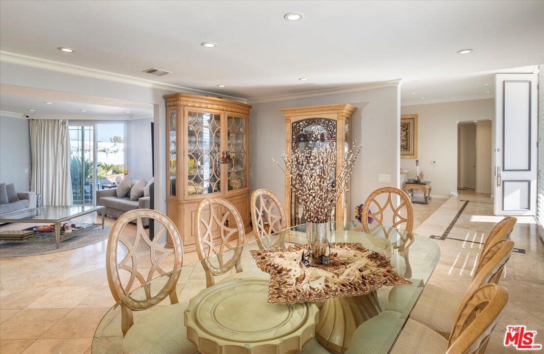 1975 Deermont Road Glendale, CA 91207 - Photo 9 of 42 a view of a dining room with furniture a chandelier and windows