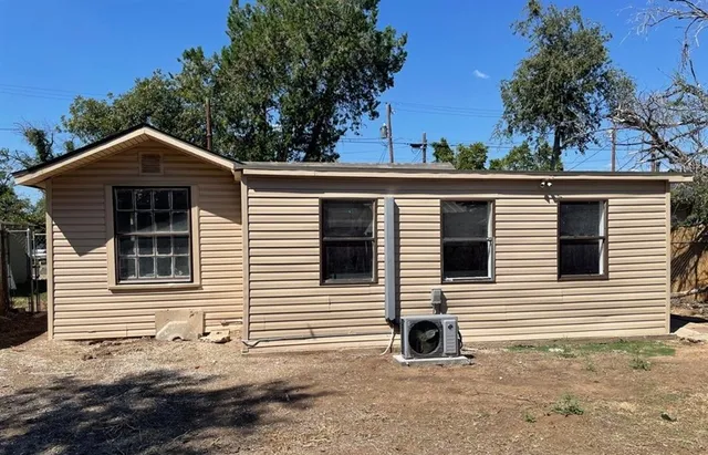 a front view of a house with a garage