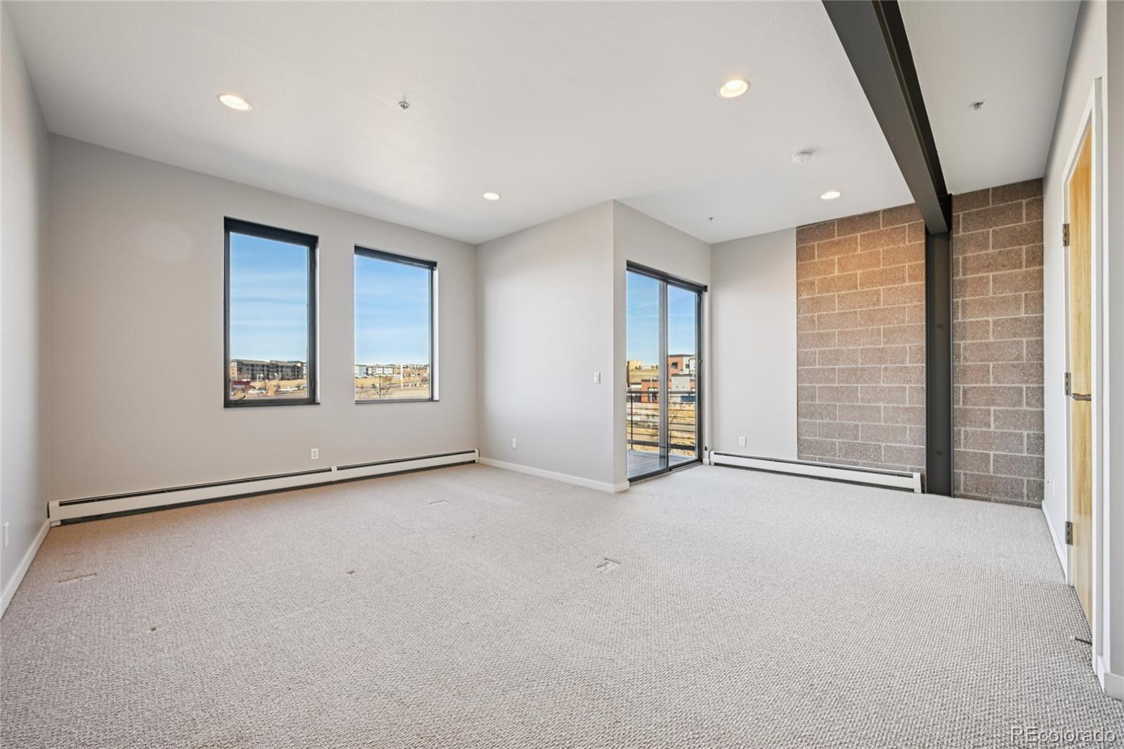 11562 Colony Row Broomfield, CO 80021 - Photo 30 of 48 an empty room with windows