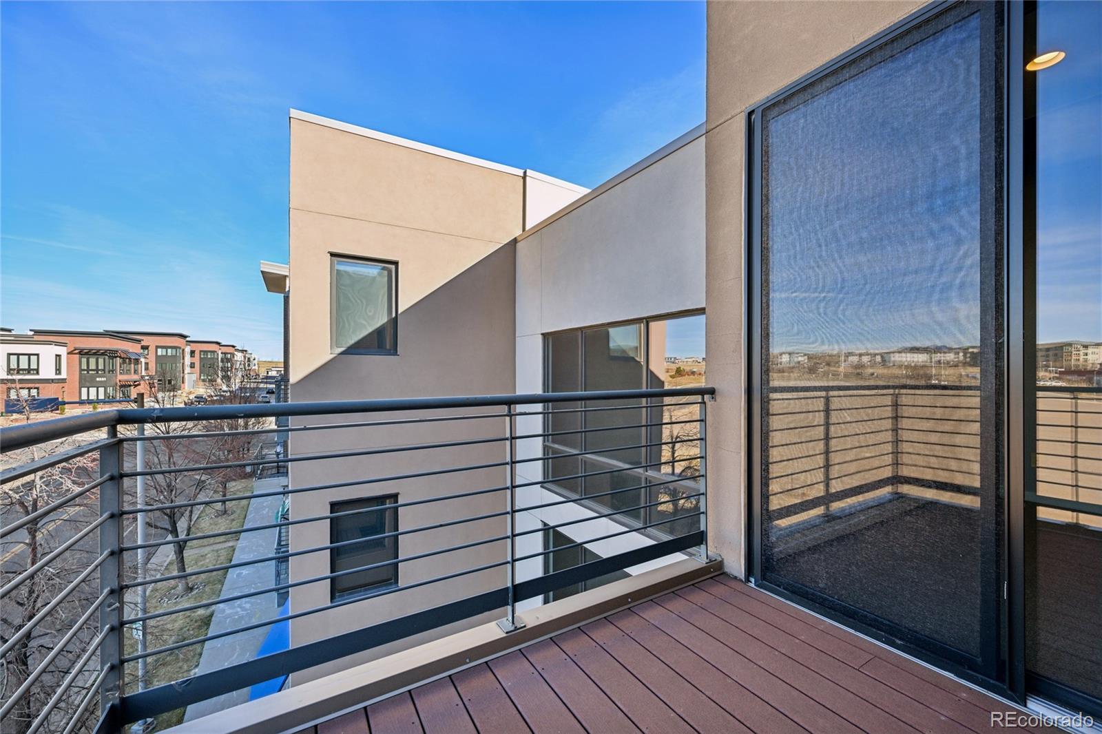 11562 Colony Row Broomfield, CO 80021 - Photo 33 of 48 a balcony view with a door
