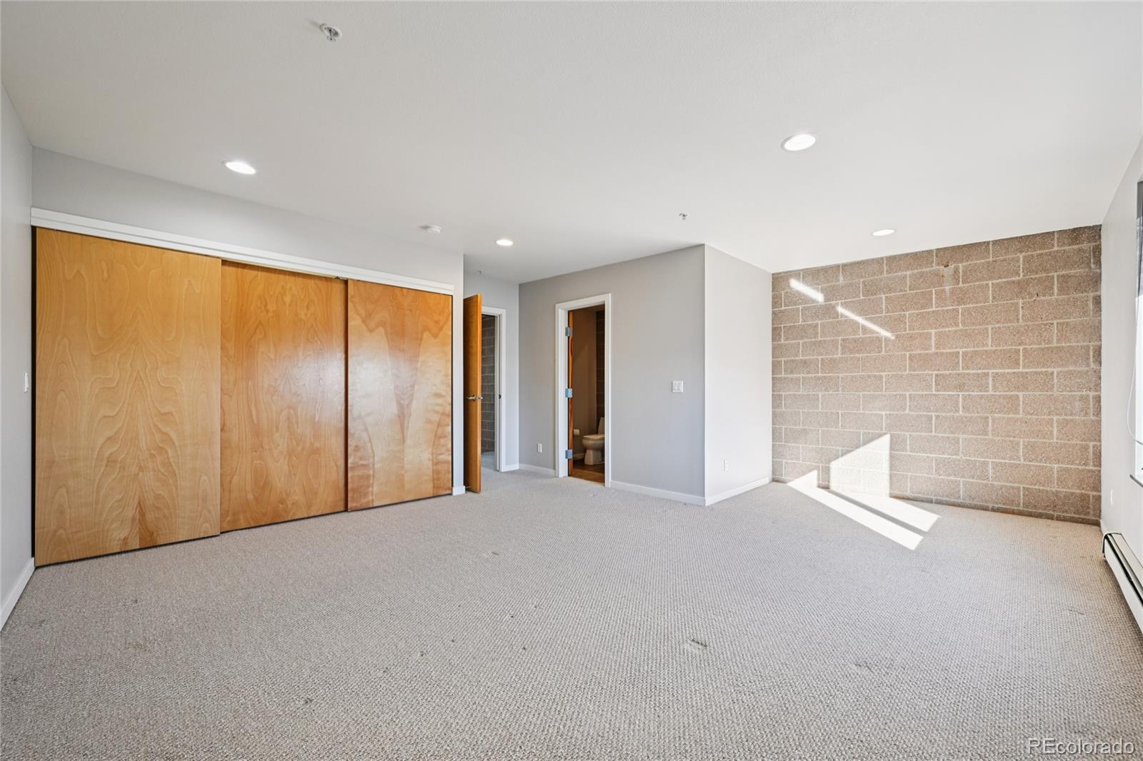 11562 Colony Row Broomfield, CO 80021 - Photo 39 of 48 a view of an empty room with windows