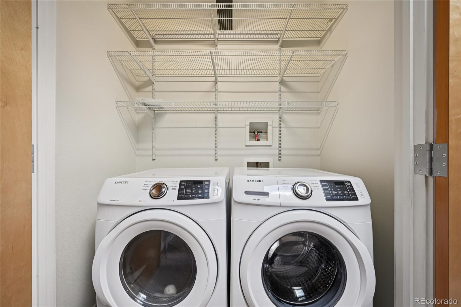 11562 Colony Row Broomfield, CO 80021 - Photo 43 of 48 a utility room with dryer and washer