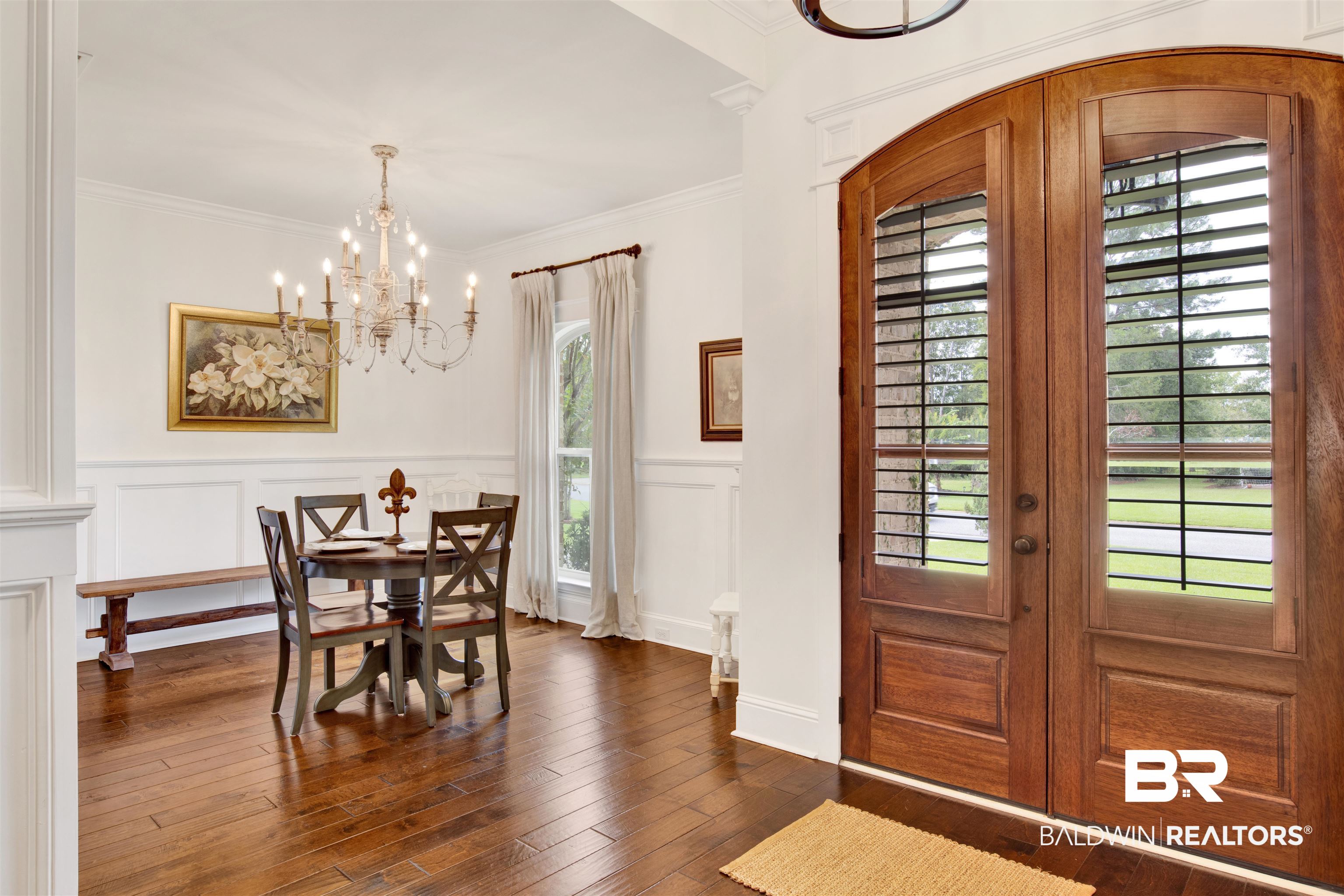 9240 Bay Point Drive Elberta, AL 36530 - Photo 9 of 22 Entrance foyer featuring ornamental molding, an inviting chandelier, and dark hardwood / wood-style flooring
