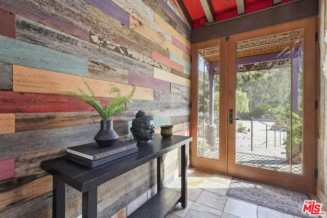 a bed room with a bed and a fireplace