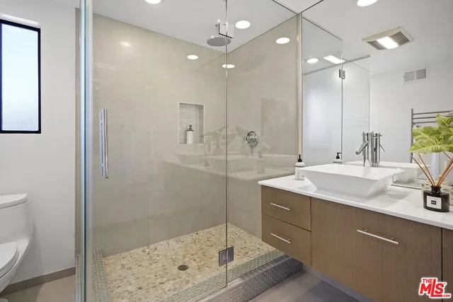 a view of a swimming pool and lounge chair