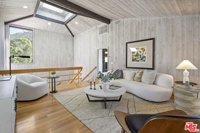 a view of a chairs and tables in the patio