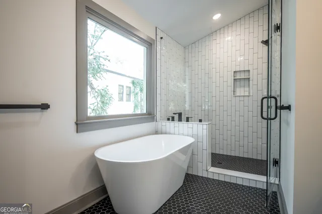 a bathroom with a sink vanity and mirror
