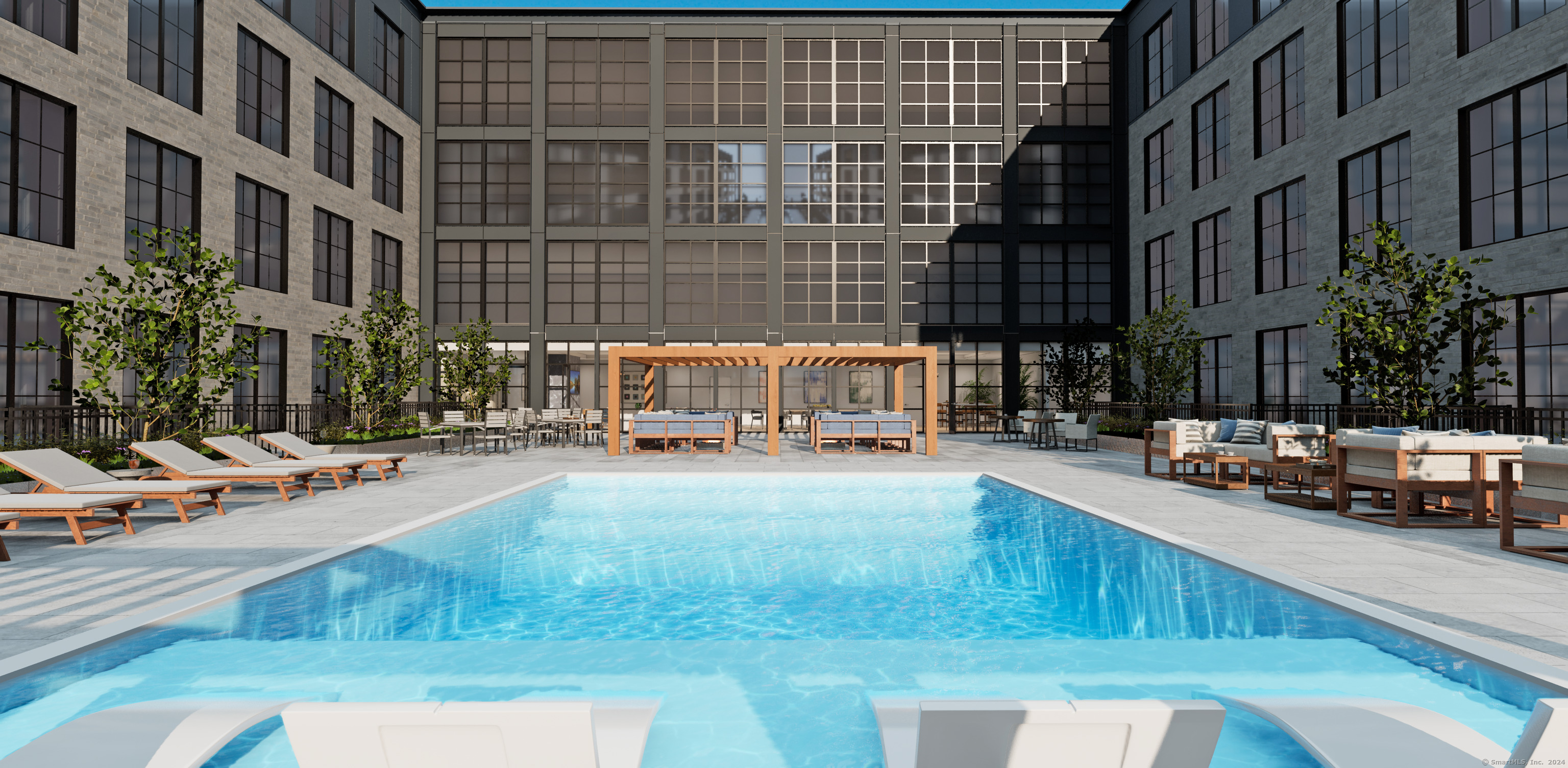 2 Arapahoe Road, Unit 603 West Hartford, CT 06107 - Photo 9 of 29 a view of a swimming pool with a lounge chairs