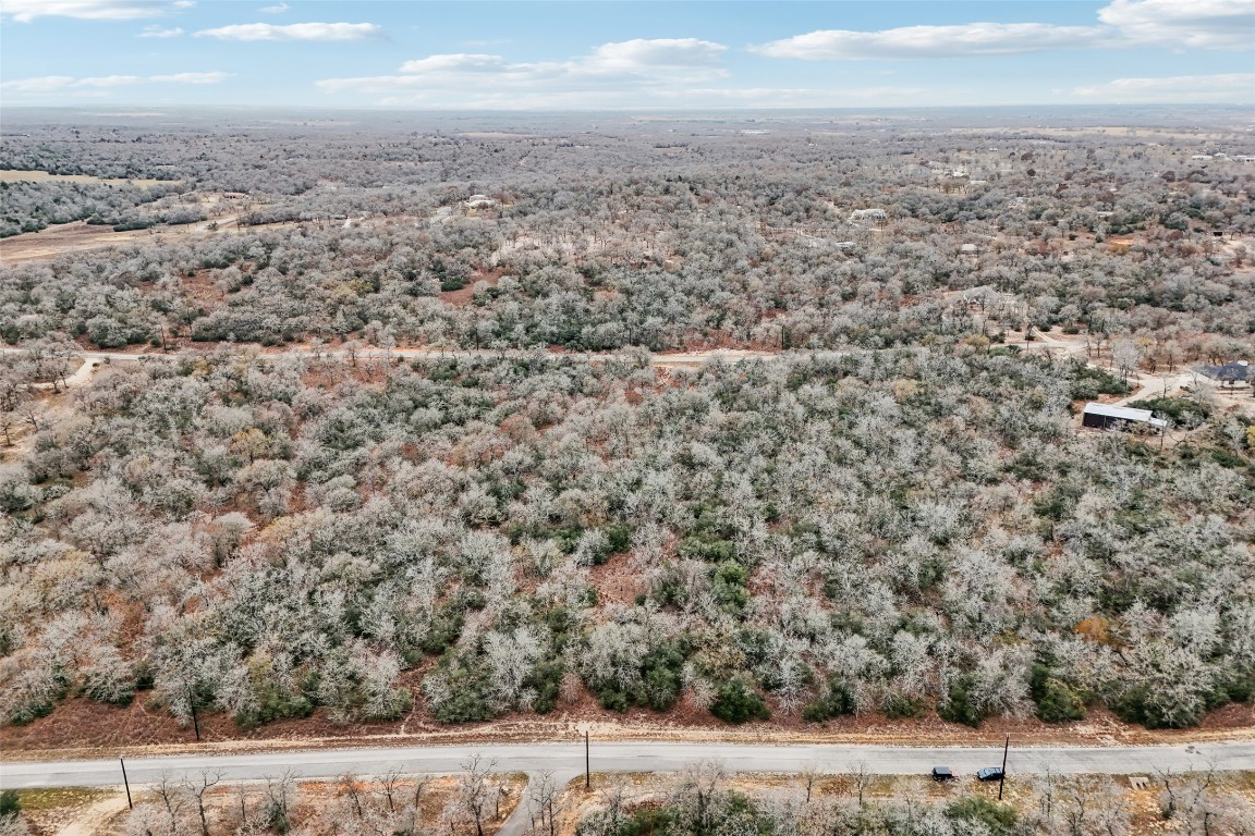 0 Flash Circle Luling, TX 78648 - Photo 2 of 15 View of property location with a forest