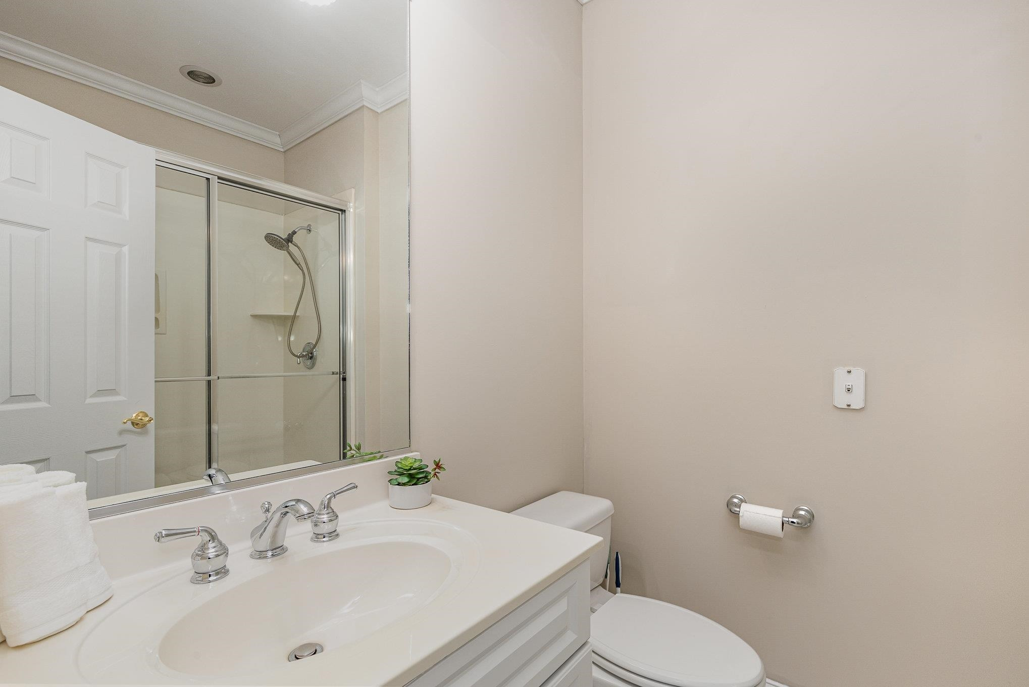 4046 Fairground Road Dunn, NC 28334 - Photo 13 of 50 a bathroom with a sink a toilet and shower
