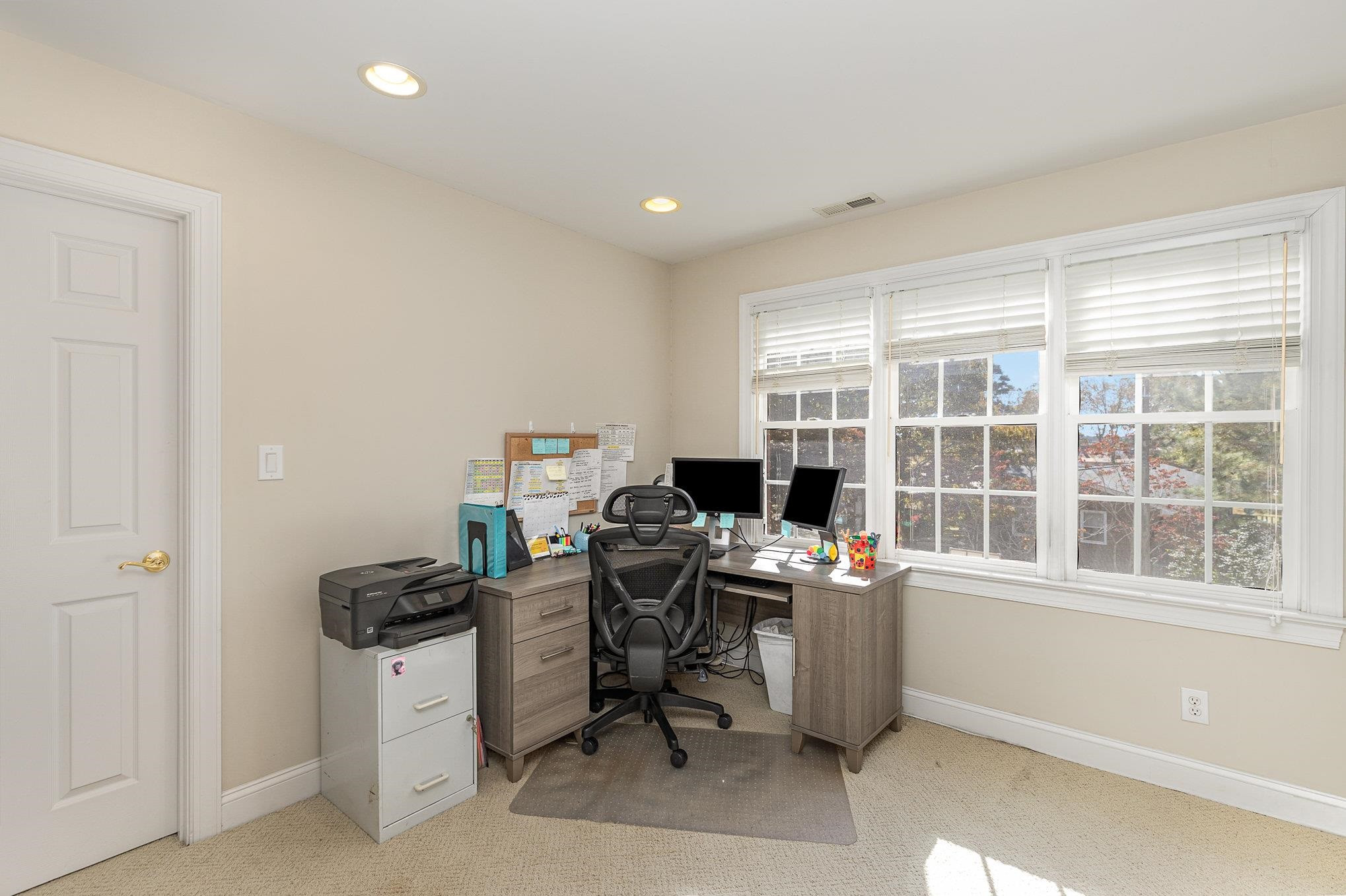 4046 Fairground Road Dunn, NC 28334 - Photo 22 of 50 a view of a workspace with furniture and a window