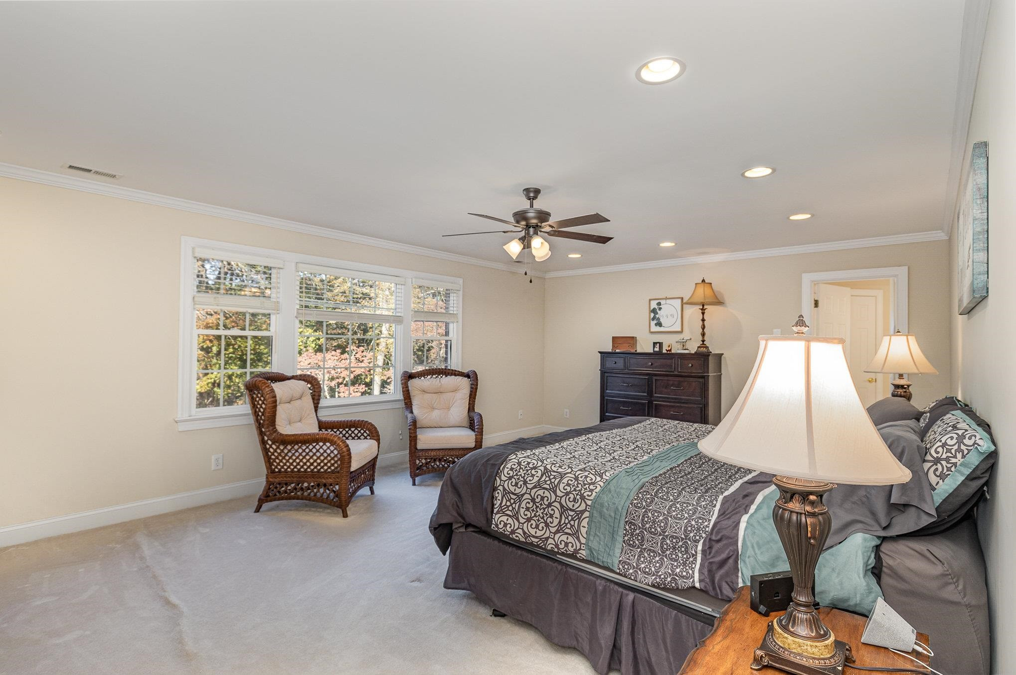 4046 Fairground Road Dunn, NC 28334 - Photo 27 of 50 a bedroom with a bed and balcony view
