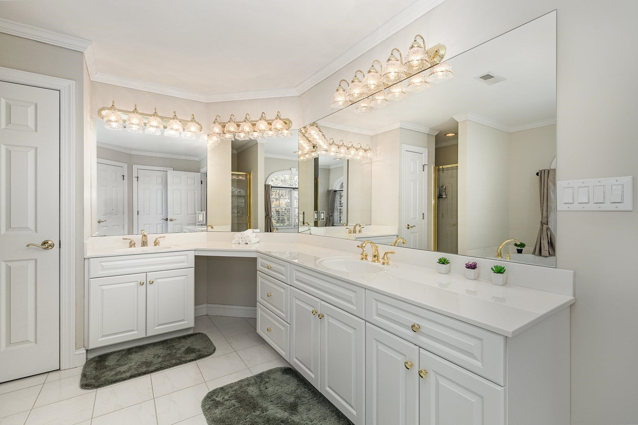 4046 Fairground Road Dunn, NC 28334 - Photo 28 of 50 a spacious bathroom with a double vanity sink mirror and bathtub