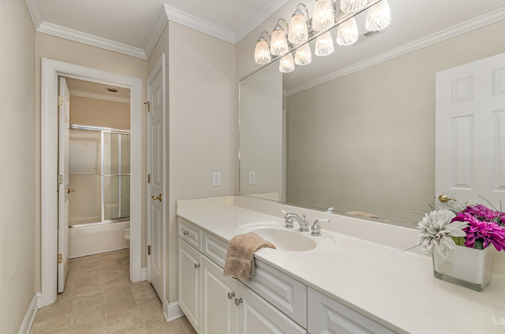 4046 Fairground Road Dunn, NC 28334 - Photo 33 of 50 a bathroom with a sink vanity and a mirror