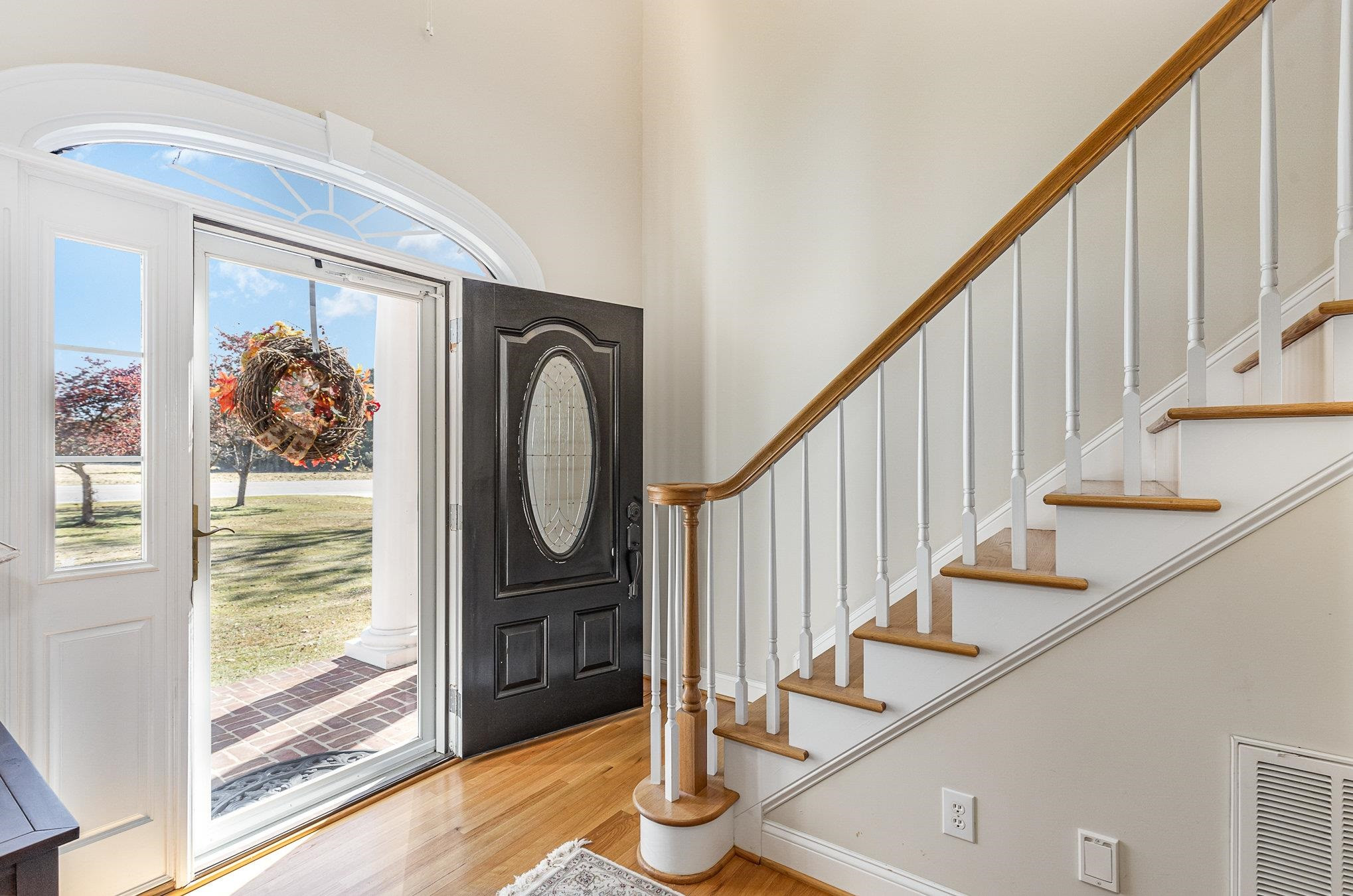4046 Fairground Road Dunn, NC 28334 - Photo 34 of 50 a view of entryway with wooden floor and door