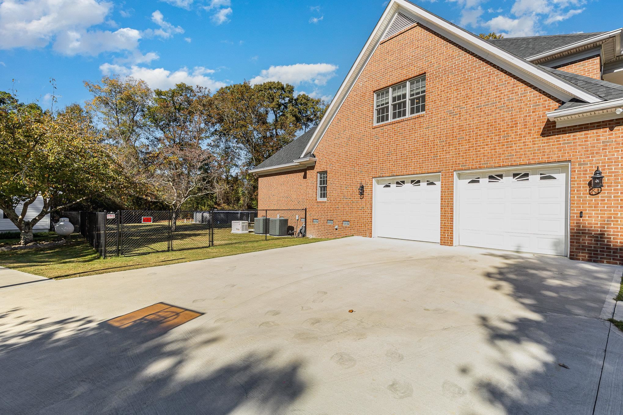 4046 Fairground Road Dunn, NC 28334 - Photo 35 of 50 a view of a house with snow on the road