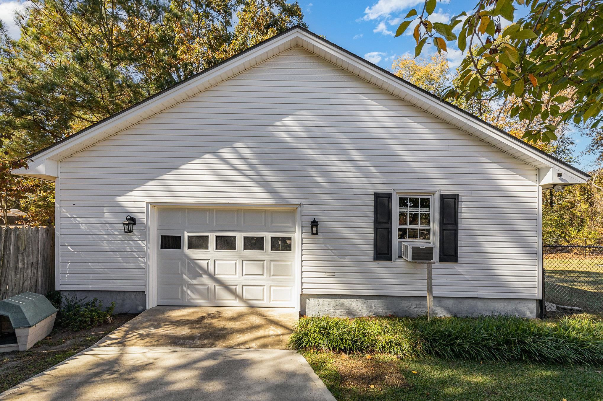 4046 Fairground Road Dunn, NC 28334 - Photo 36 of 50 a view of a house with yard