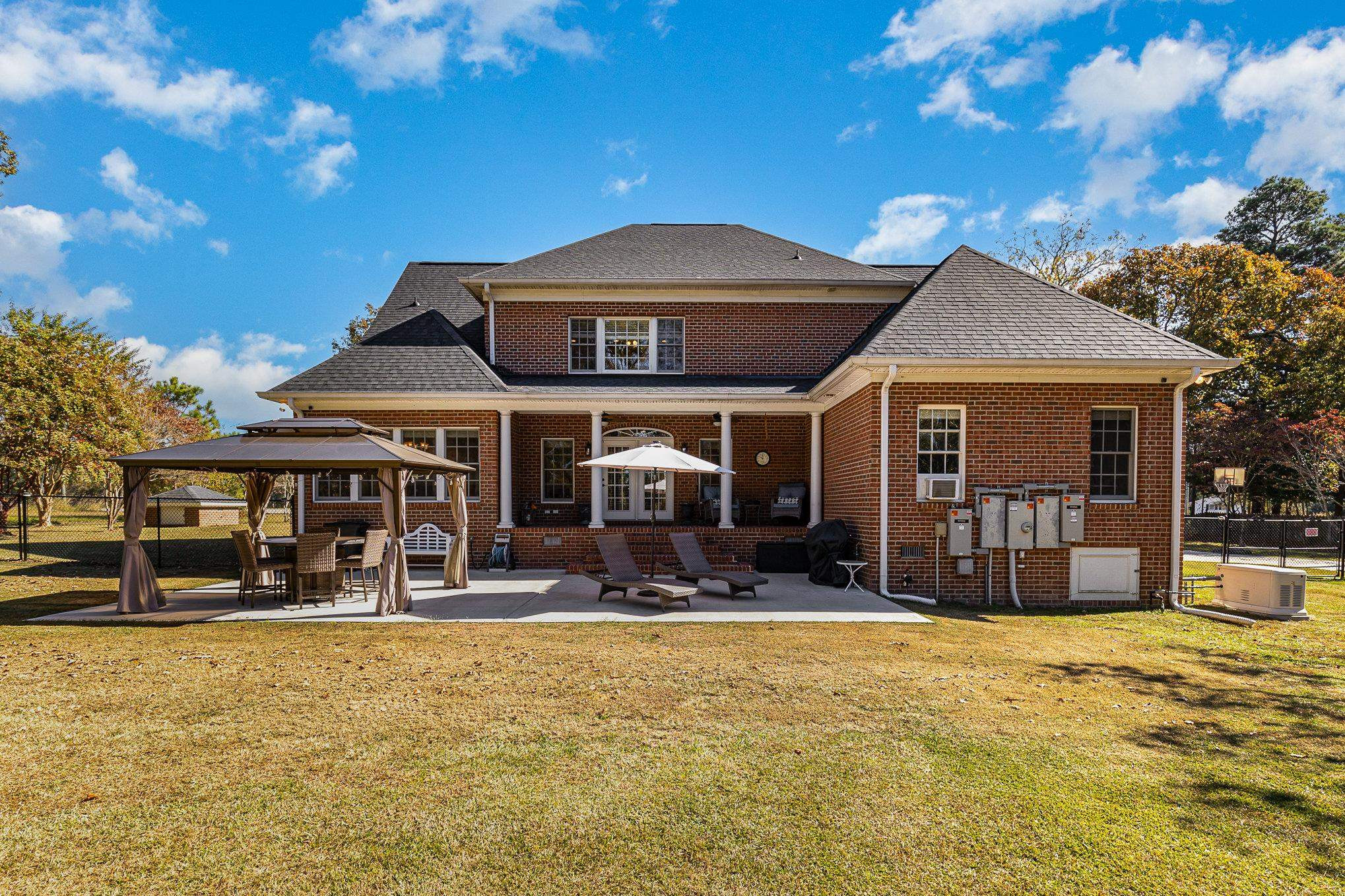 4046 Fairground Road Dunn, NC 28334 - Photo 37 of 50 a front view of a house with a patio