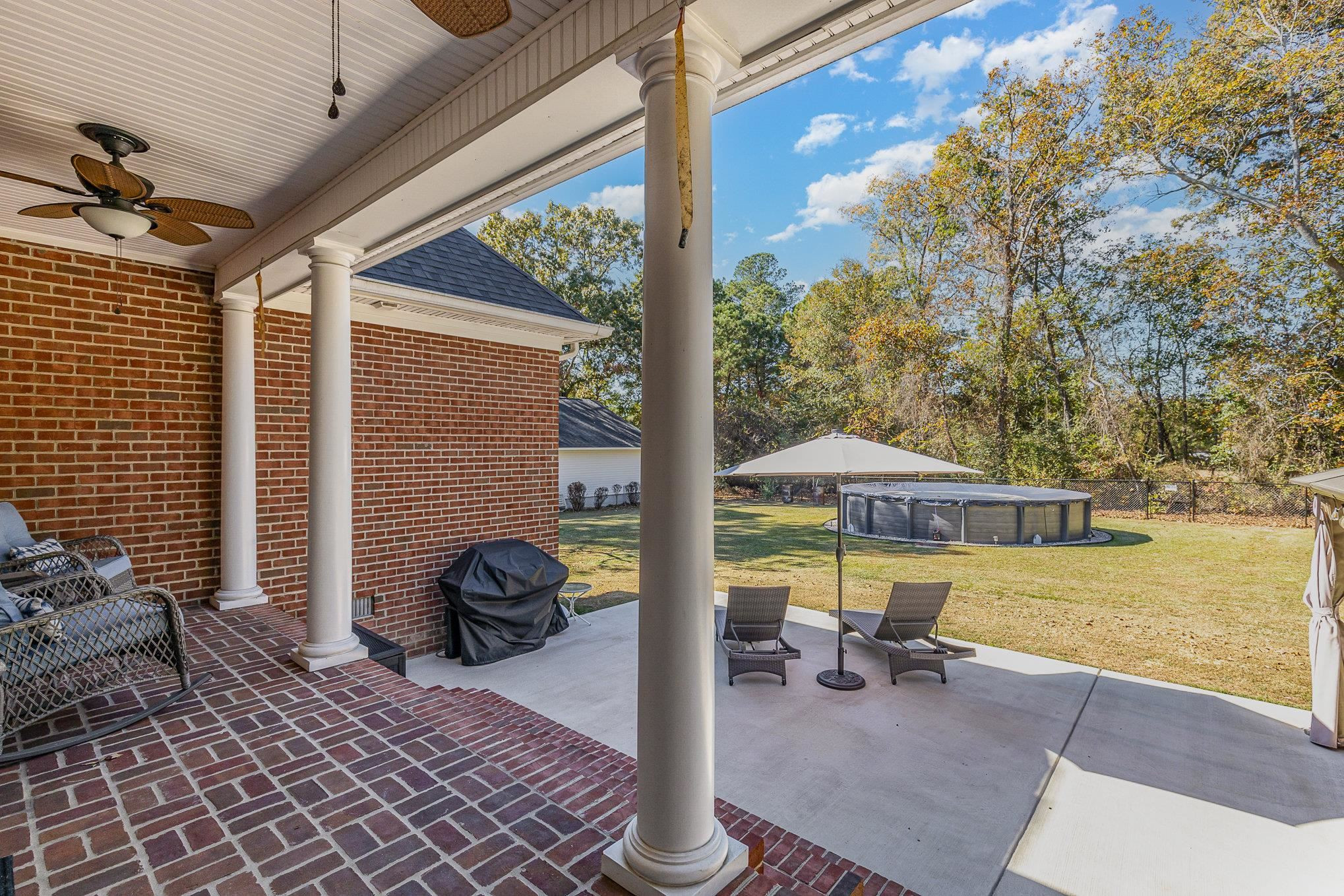 4046 Fairground Road Dunn, NC 28334 - Photo 41 of 50 a view of living room with patio furniture and wooden floor
