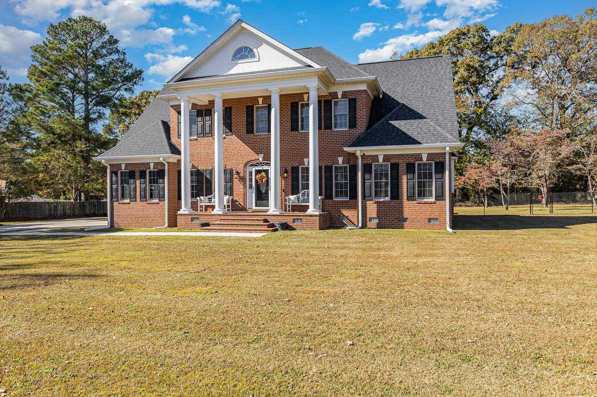 4046 Fairground Road Dunn, NC 28334 - Photo 44 of 50 front view of a building with a yard