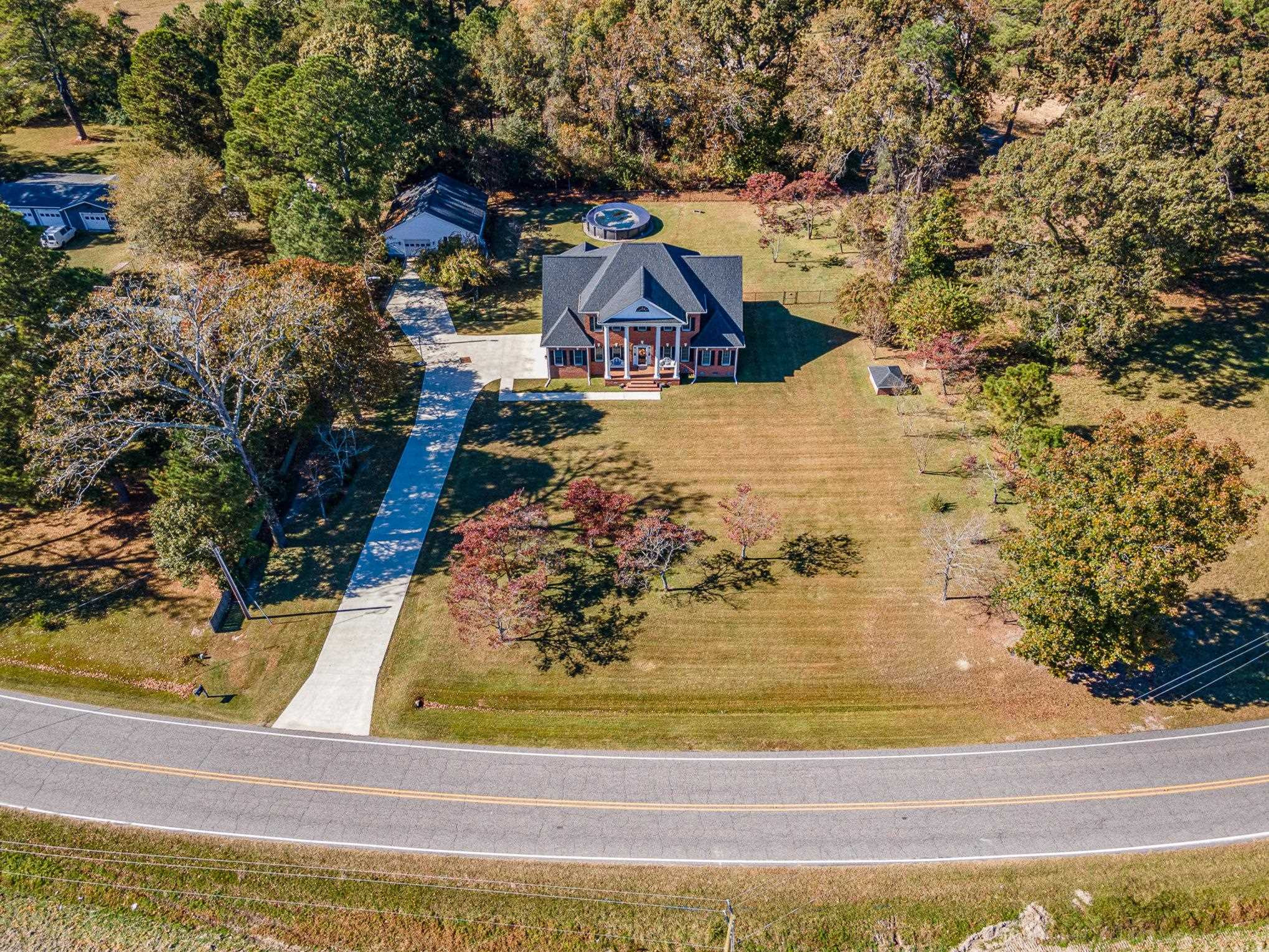 4046 Fairground Road Dunn, NC 28334 - Photo 48 of 50 a view of residential houses with outdoor space