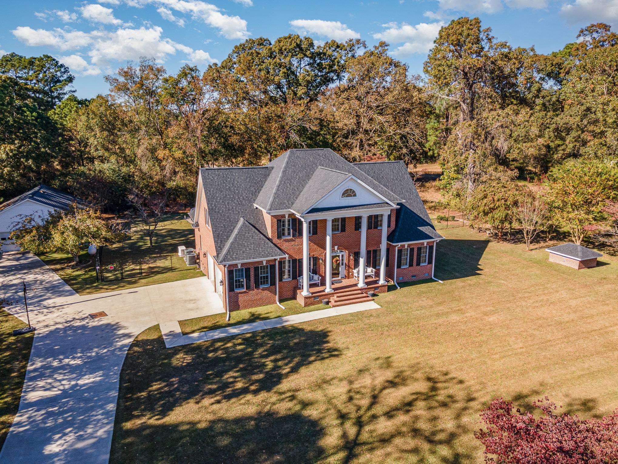 4046 Fairground Road Dunn, NC 28334 - Photo 50 of 50 an aerial view of a house