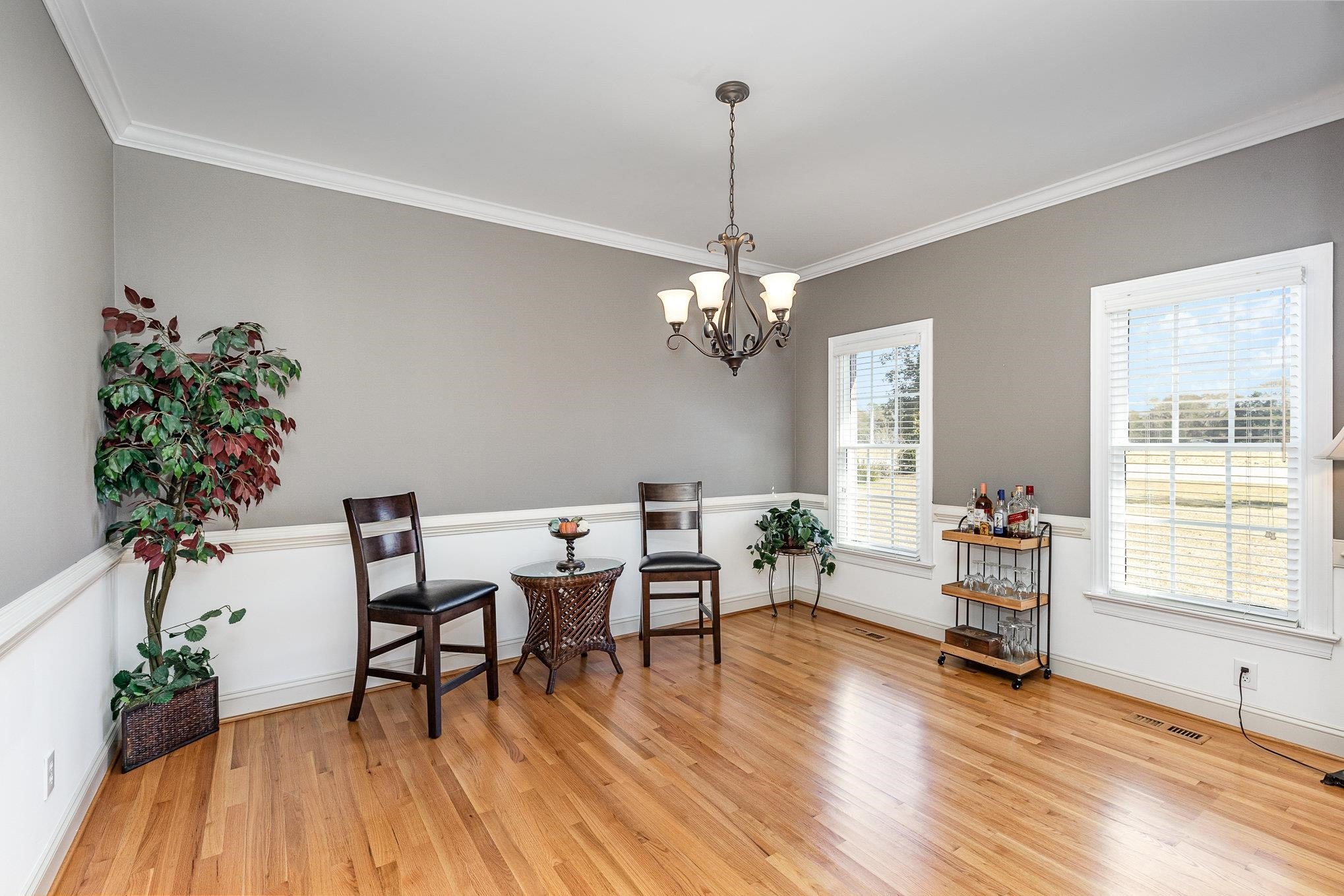 4046 Fairground Road Dunn, NC 28334 - Photo 7 of 50 a view of a livingroom with furniture window and wooden floor