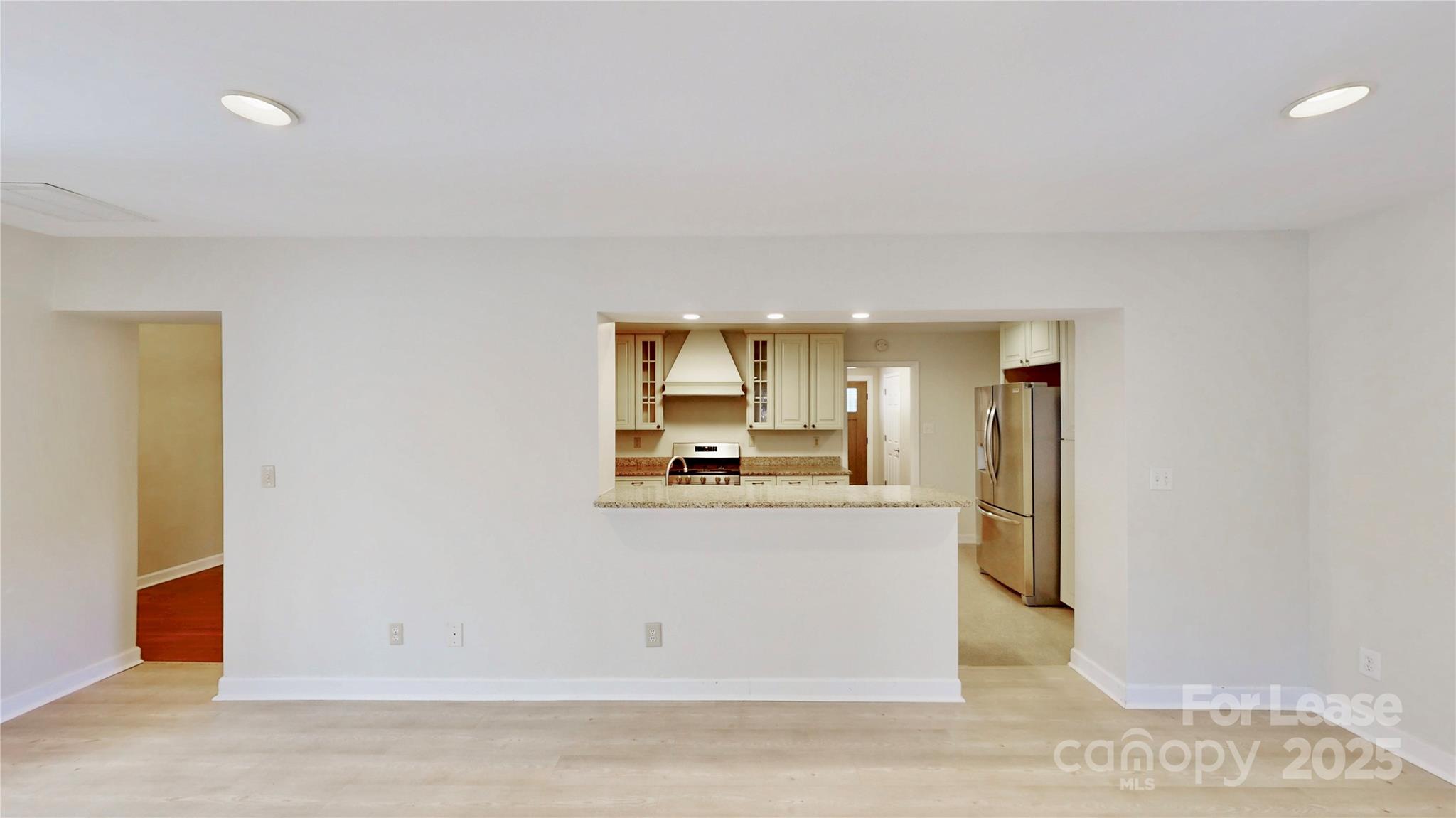 2844 Goneaway Road Charlotte, NC 28210 - Photo 19 of 41 a view of a kitchen with wooden floor