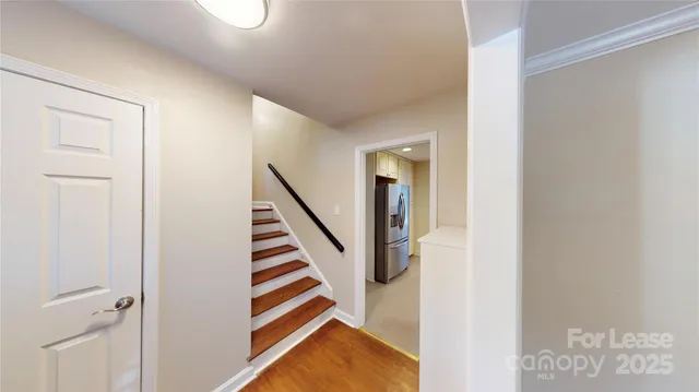 a view of a hallway with entryway