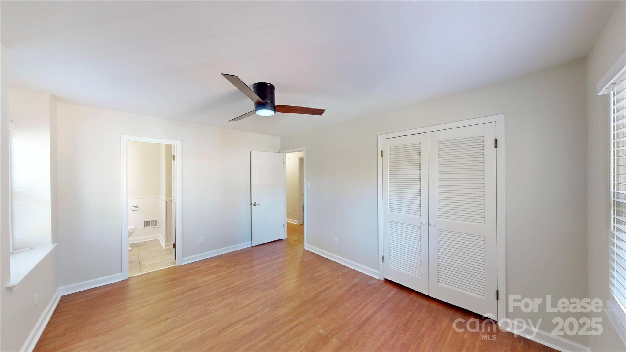2844 Goneaway Road Charlotte, NC 28210 - Photo 27 of 41 a view of empty room with wooden floor