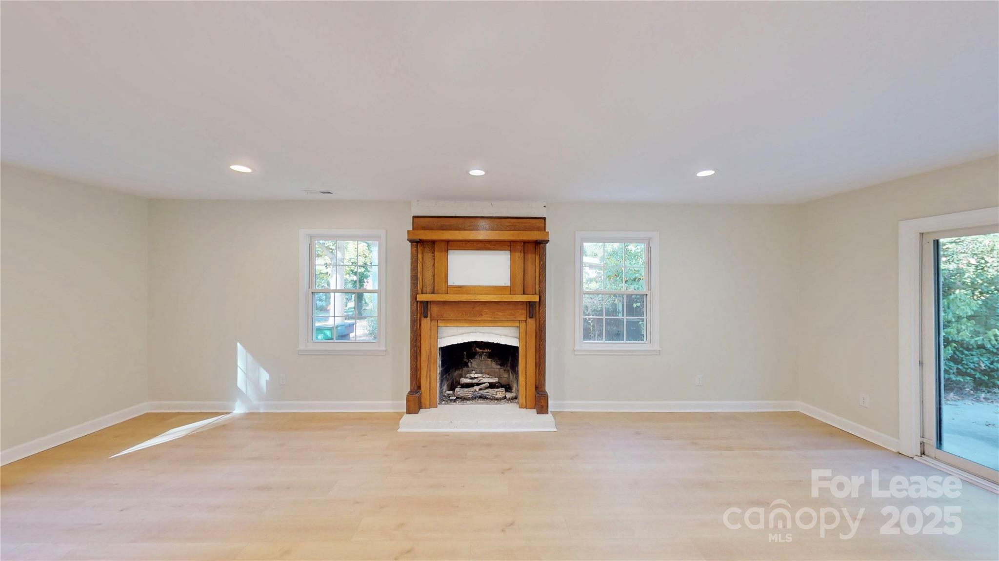 2844 Goneaway Road Charlotte, NC 28210 - Photo 34 of 41 a view of empty room with a fireplace