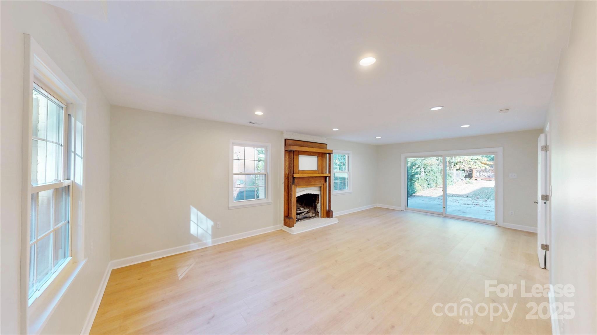 2844 Goneaway Road Charlotte, NC 28210 - Photo 38 of 41 a view of a livingroom with a fireplace and window