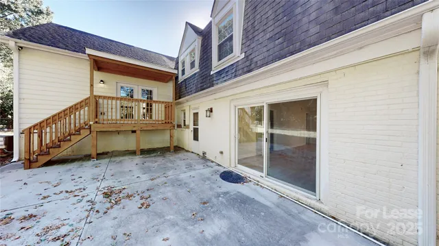 a view of a house with wooden floor and a stairs