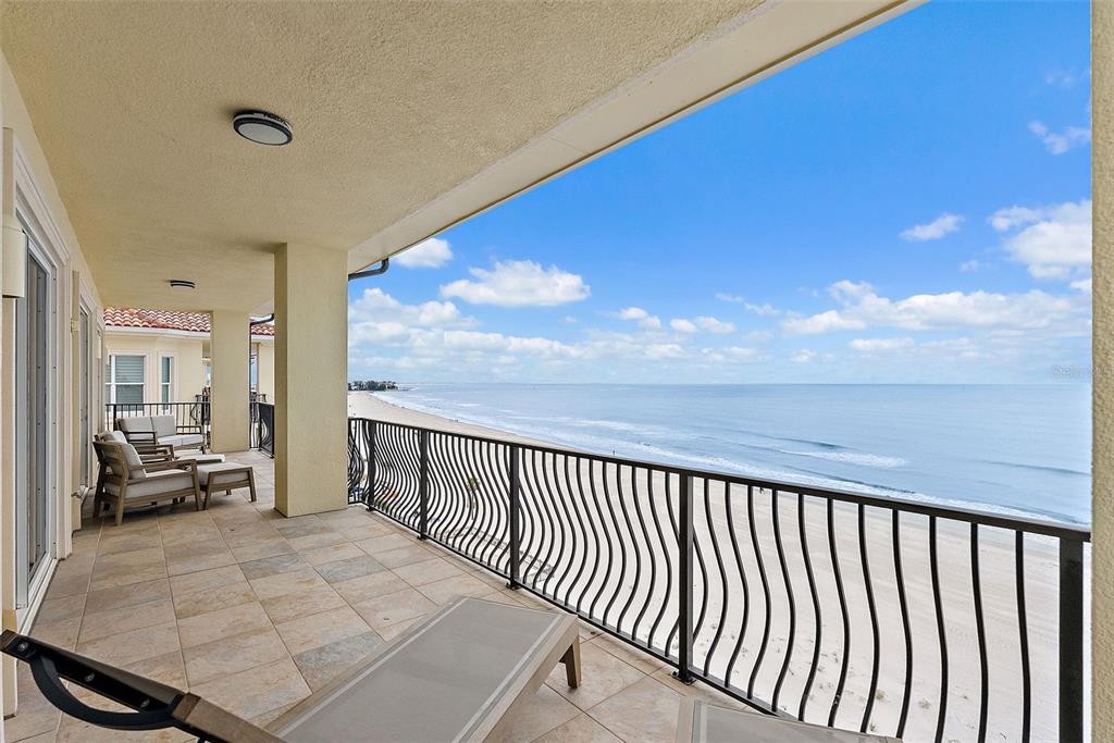 13630 Gulf Boulevard, Unit 700C Madeira Beach, FL 33708 - Photo 18 of 78 a view of balcony with couch