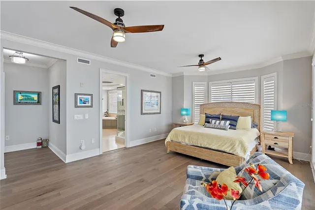 a bedroom with a bed and with the view of bathroom