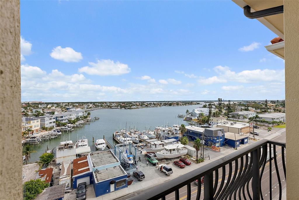 13630 Gulf Boulevard, Unit 700C Madeira Beach, FL 33708 - Photo 39 of 78 a view of a balcony with an ocean view