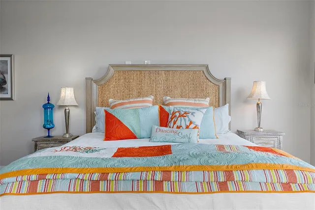 a view of a room with table and chairs