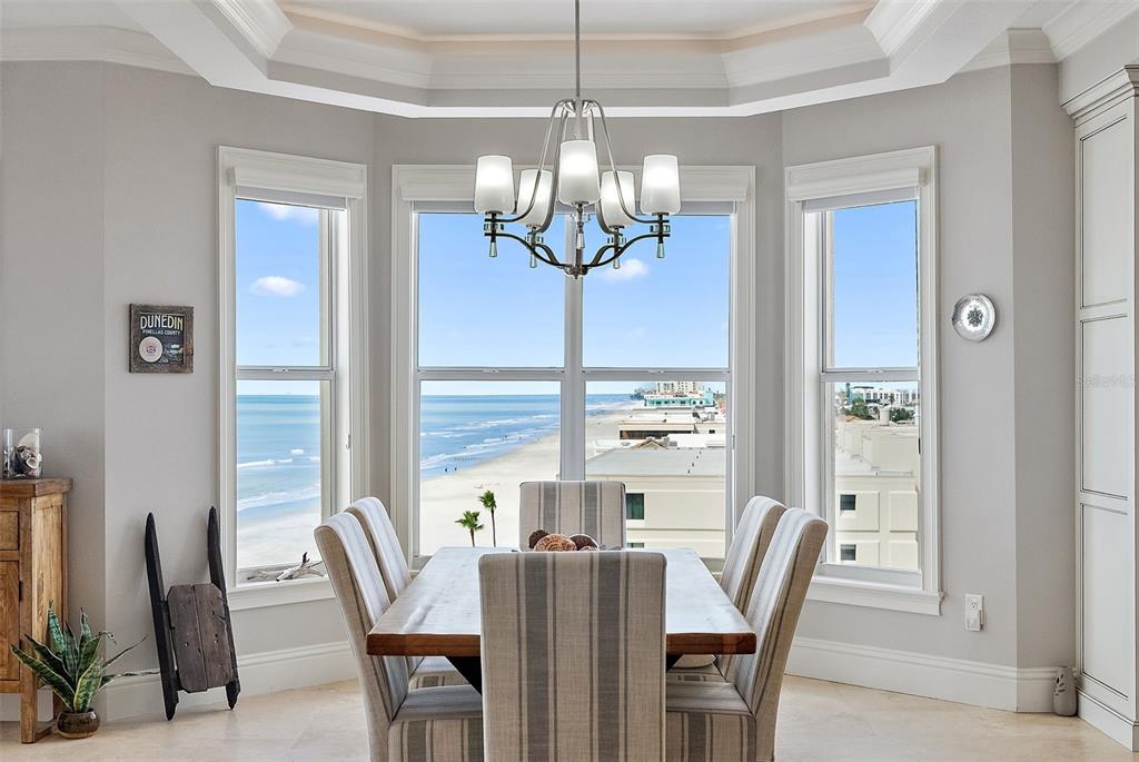 13630 Gulf Boulevard, Unit 700C Madeira Beach, FL 33708 - Photo 48 of 78 a view of a dining room with furniture window and outside view