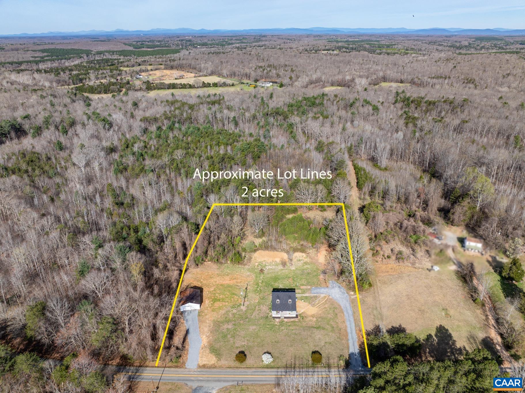 2733 Cedar Lane Road Kents Store, VA 23084 - Photo 41 of 43 A striking aerial view showcases the property beautifully surrounded by mature forest offering a sense of privacy, natural beauty and peaceful seclusion