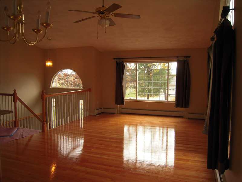 80 Maple Street Coventry, RI 02816 - Photo 3 of 16 Living Room. Newly refinished hardwoods in living, dining and kitchen