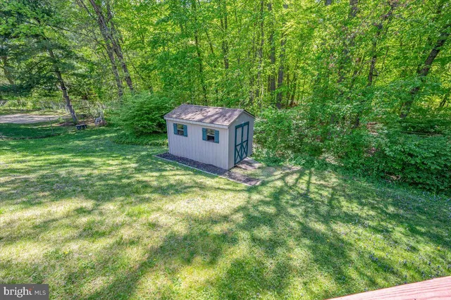 a fire hydrant in the middle of a field
