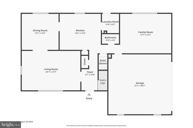 an aerial view of a house with swimming pool and garden