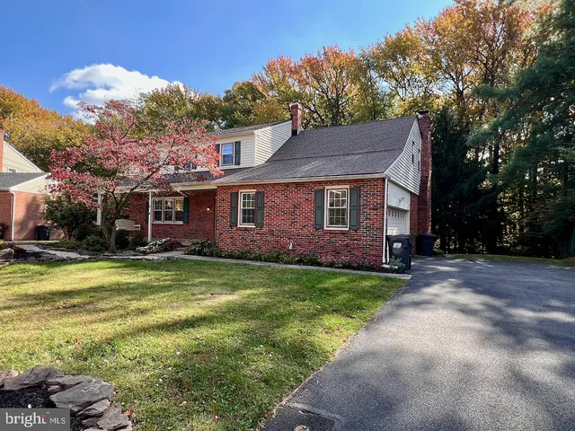 a picture of a refrigerator with a white wall