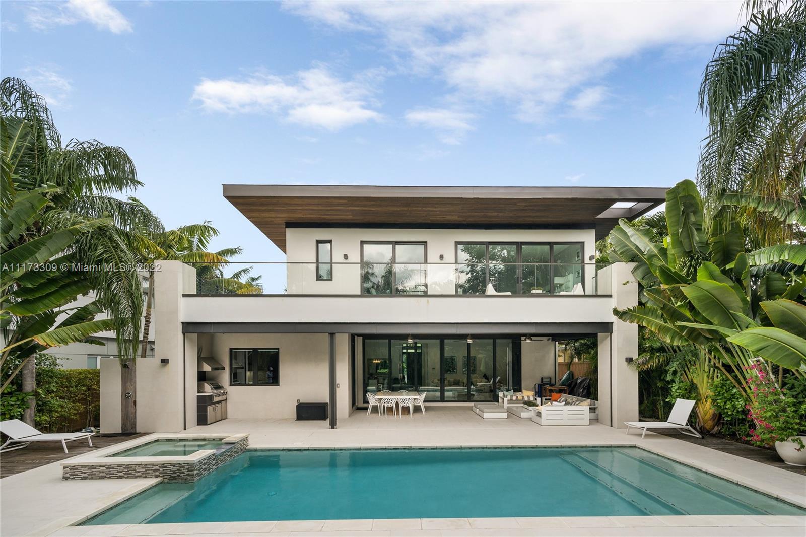 a front view of a house with patio