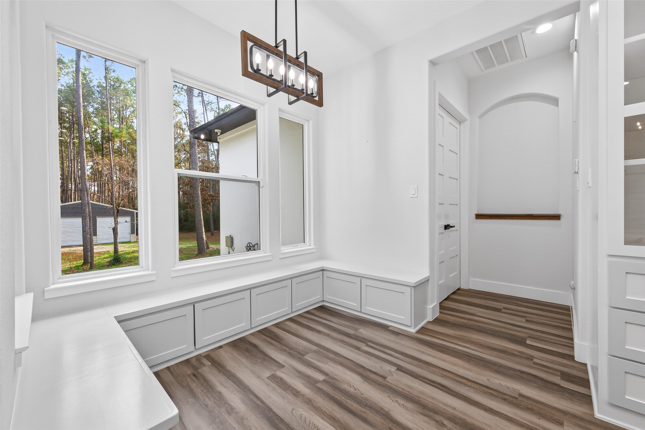 360 Dipping Vat Road Huntsville, TX 77340 - Photo 13 of 38 Casual dining with built in seating and storage.