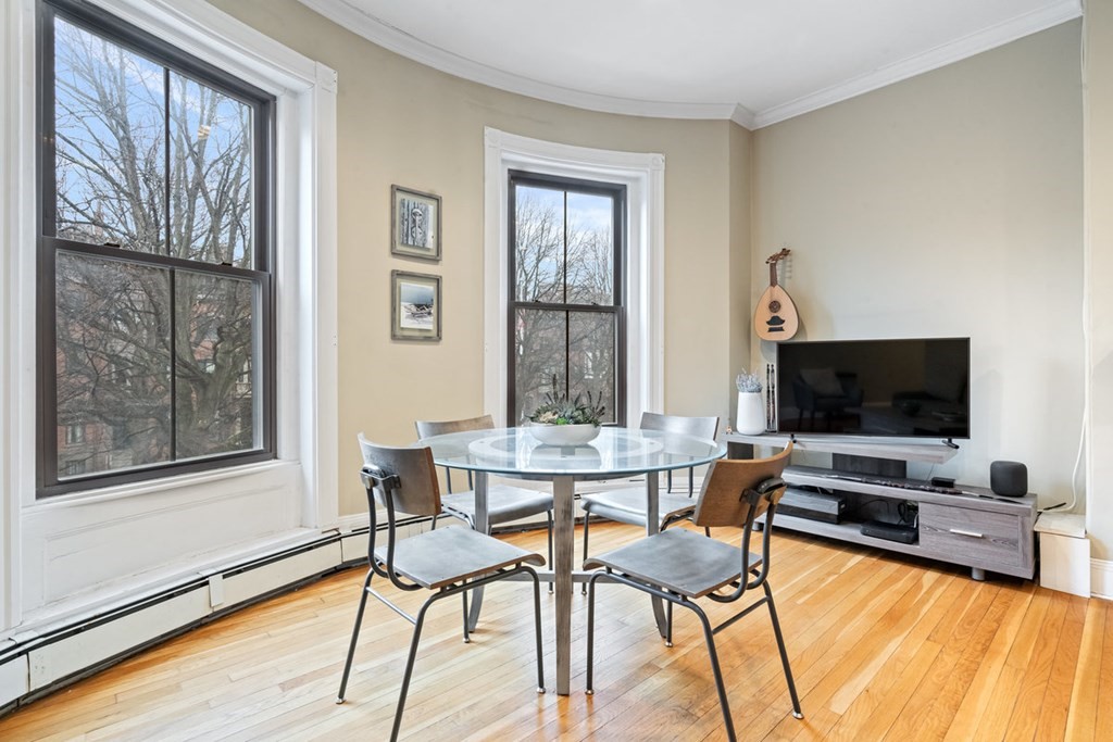 32 Union Park, Unit 2 Boston, MA 02118 - Photo 2 of 19 a view of a livingroom with furniture and a flat screen tv